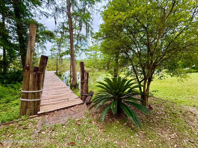 8713 Bayou Castelle Drive, Gautier, MS 39553
