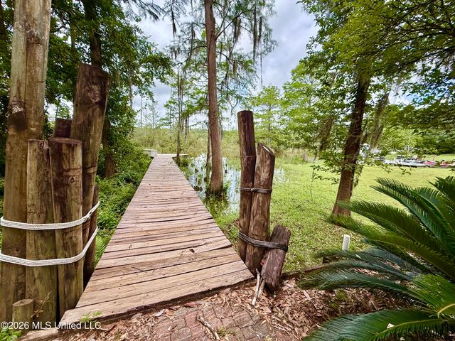 8713 Bayou Castelle Drive, Gautier, MS 39553