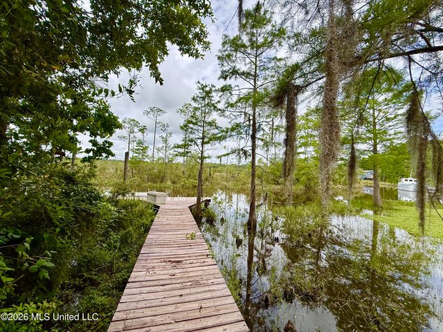 8713 Bayou Castelle Drive, Gautier, MS 39553