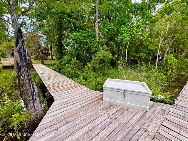 8713 Bayou Castelle Drive, Gautier, MS 39553