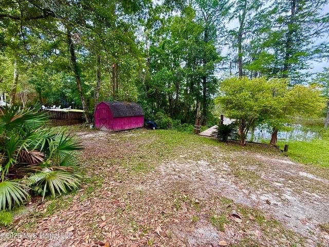 8713 Bayou Castelle Drive, Gautier, MS 39553