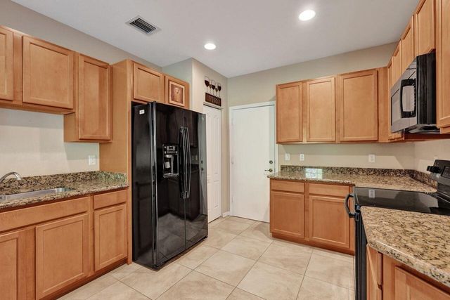 4603 Cohune Palm Court, Greenacres, FL 33463