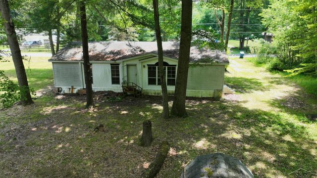 820 W Sand Beach Drive, Sanford, MI 48657