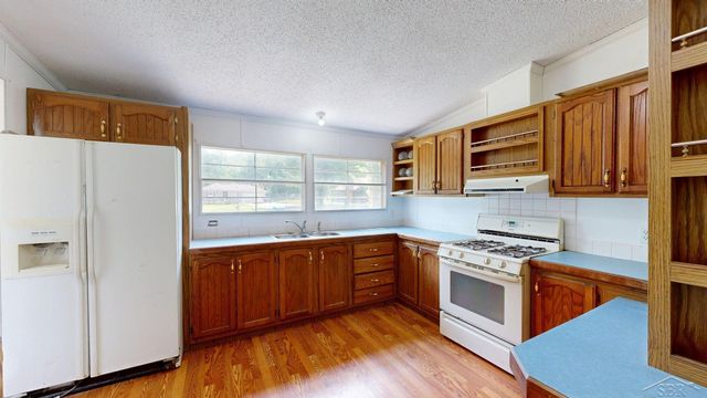 820 W Sand Beach Drive, Sanford, MI 48657