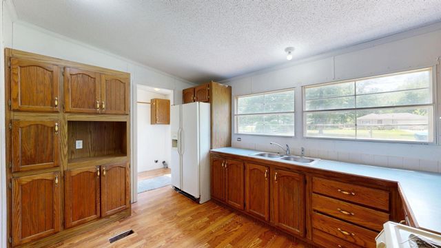 820 W Sand Beach Drive, Sanford, MI 48657