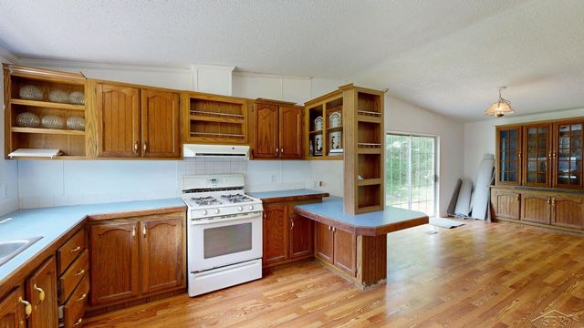820 W Sand Beach Drive, Sanford, MI 48657
