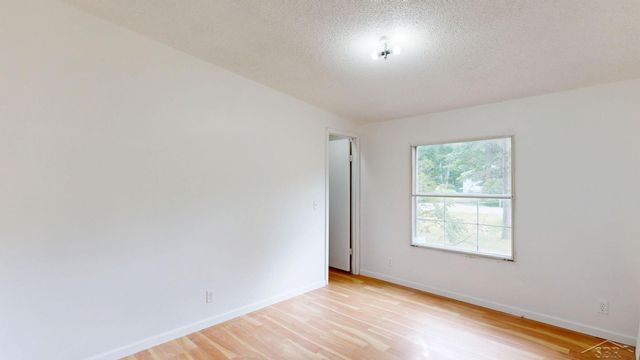 820 W Sand Beach Drive, Sanford, MI 48657