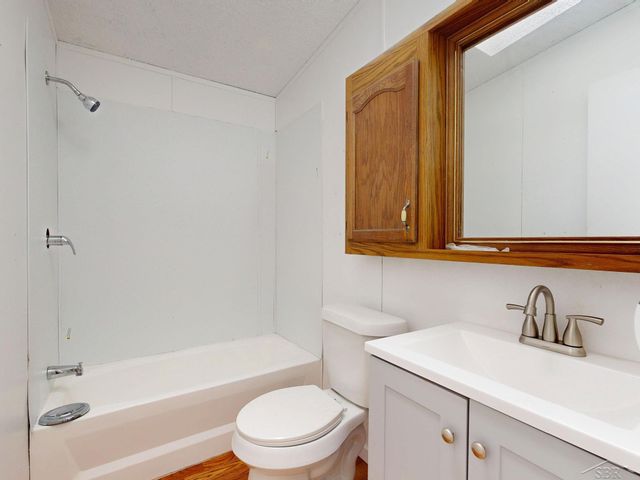 820 W Sand Beach Drive, Sanford, MI 48657