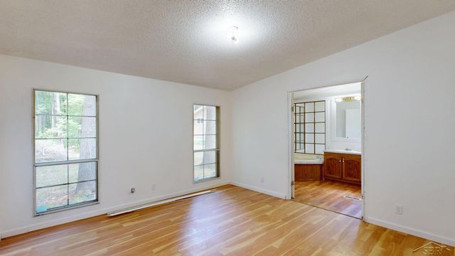 820 W Sand Beach Drive, Sanford, MI 48657