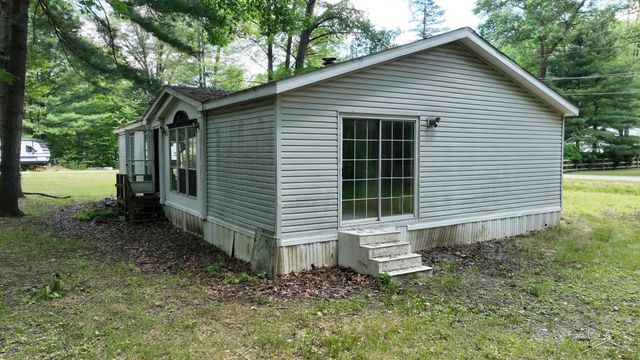 820 W Sand Beach Drive, Sanford, MI 48657