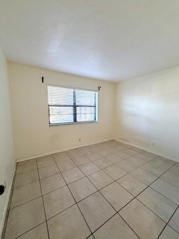 9300 SW 8th Street 107, Boca Raton, FL 33428