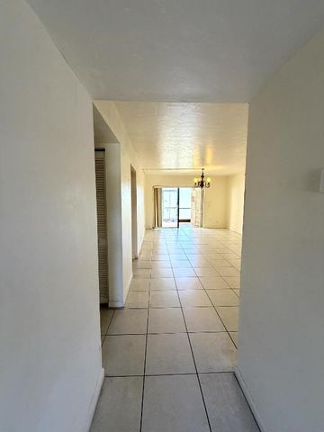 9300 SW 8th Street 107, Boca Raton, FL 33428