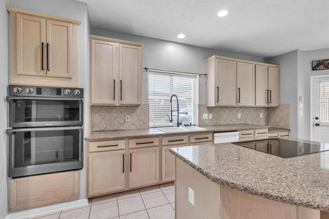 8818 Apple Mill Drive, Houston, TX 77095