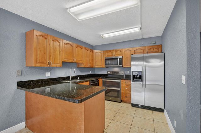 320 Woodland Road, Palm Springs, FL 33461