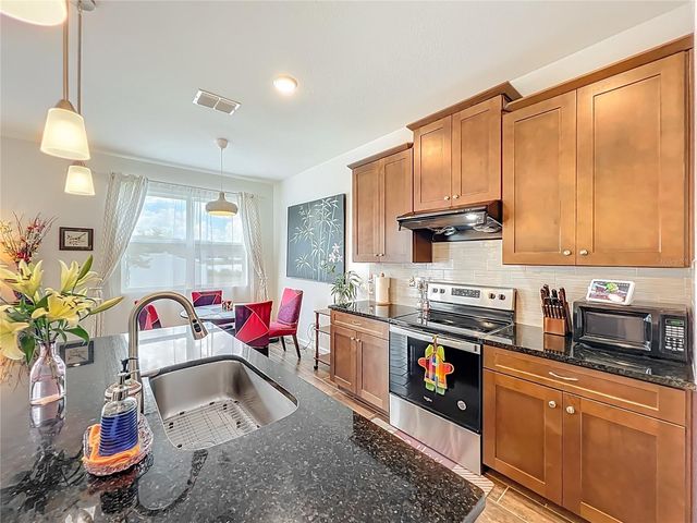 8560 COMPASS POINT AVENUE, Orlando, FL 32832