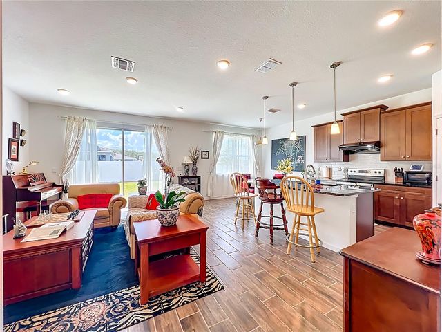 8560 COMPASS POINT AVENUE, Orlando, FL 32832