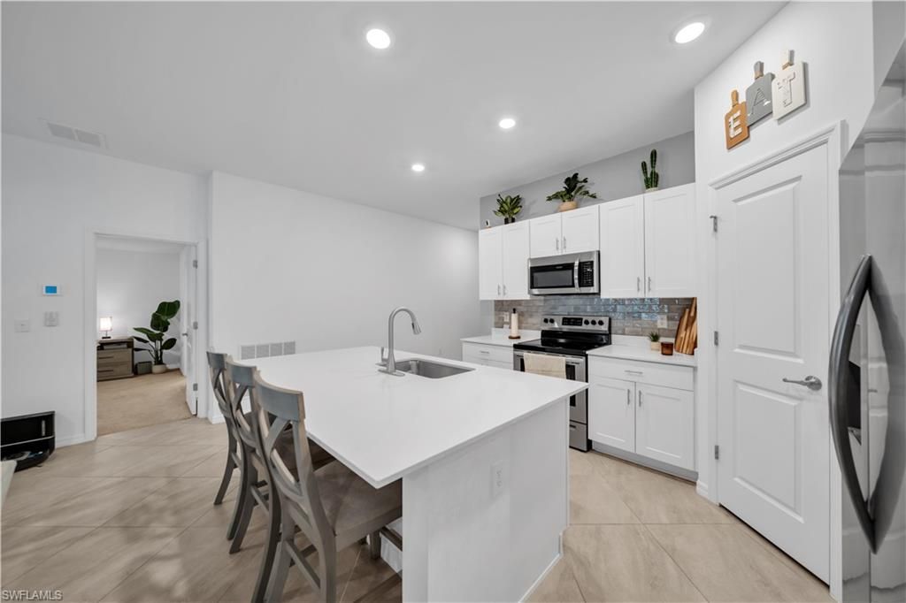 1925 NE 33rd LN, CAPE CORAL, FL 33909 — photo 4