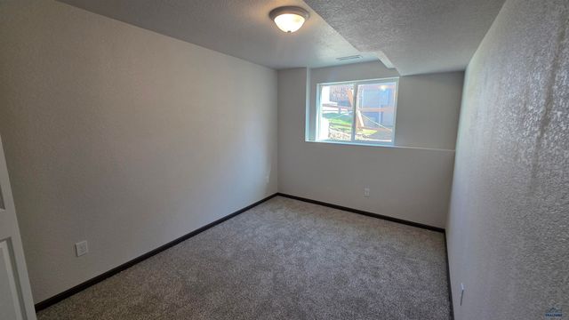 448 YELNER DR, Box Elder, SD 57719