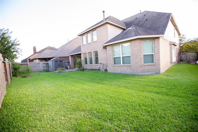 21014 Brunson Falls Drive, Richmond, TX 77407