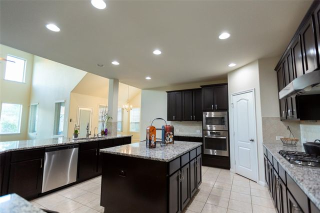 21014 Brunson Falls Drive, Richmond, TX 77407