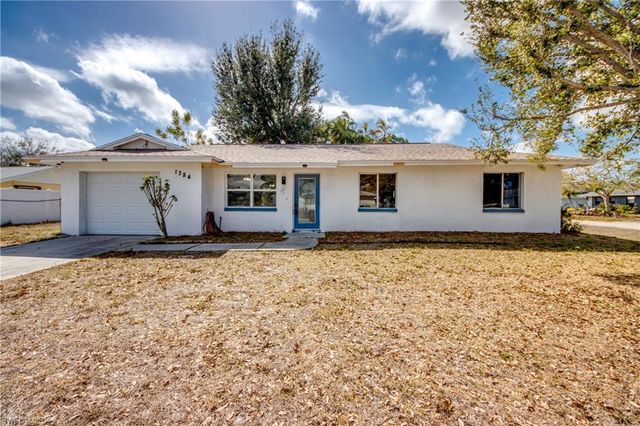 1384 Sourwood CT, North Fort Myers, FL 33917