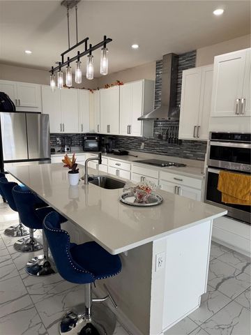 2489 BLOWING BREEZE AVENUE, Kissimmee, FL 34744