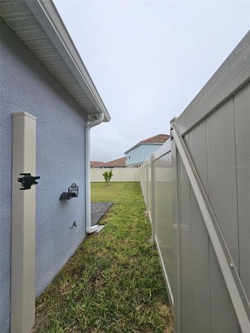 1408 OAK MARSH STREET, Davenport, FL 33837