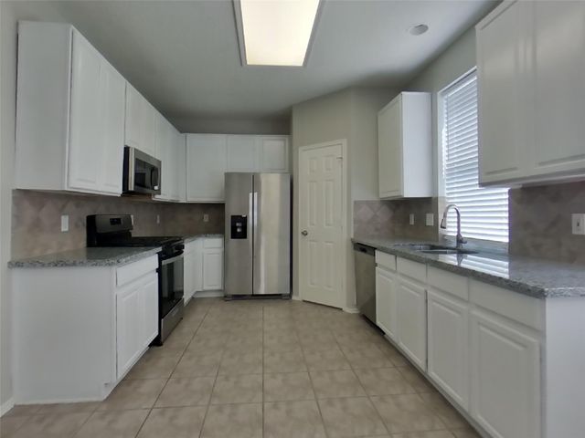 18810 Woodbreeze Drive, Humble, TX 77346