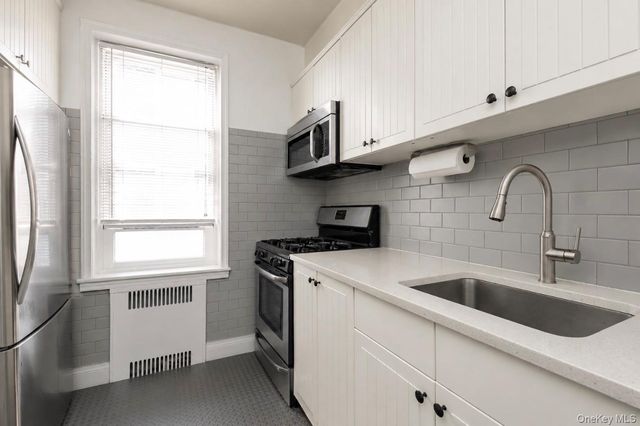 114-20 Queens Boulevard E9, Forest Hills, NY 11375