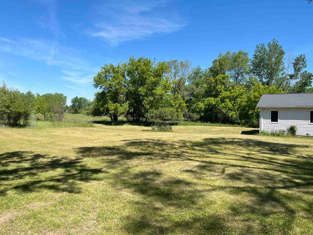 2600 W Schmeid Road, Six Lakes, MI 48886
