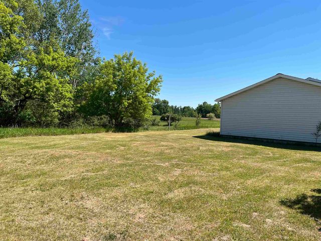 2600 W Schmeid Road, Six Lakes, MI 48886