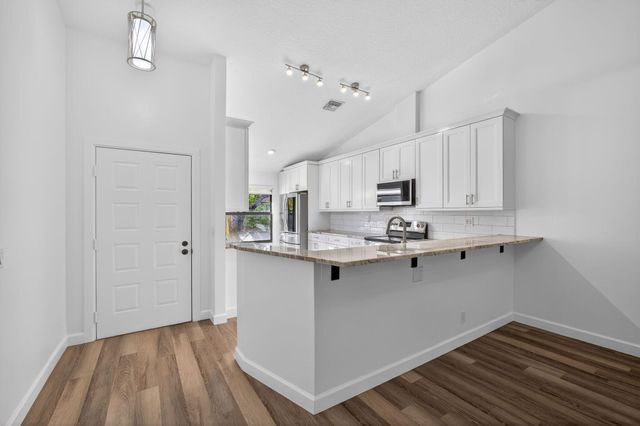 703 Saint Giles Court, Palm Beach Gardens, FL 33418