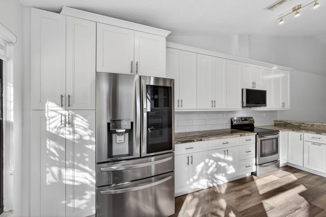 703 Saint Giles Court, Palm Beach Gardens, FL 33418