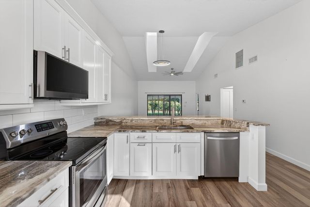 703 Saint Giles Court, Palm Beach Gardens, FL 33418