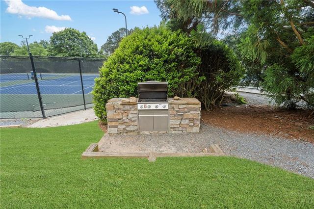 1028 Towne Lake Hills E, Woodstock, GA 30189