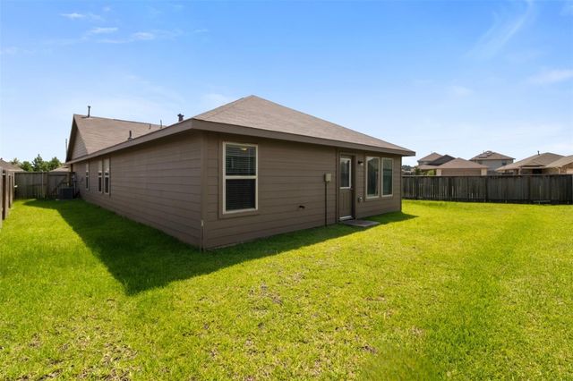 703 Larkspur Shadow Drive, Magnolia, TX 77354