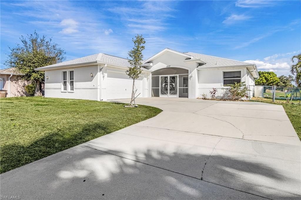 Image 1 of property listing at 1503 NW 29th PL, Cape Coral, FL 33993