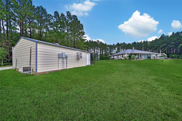 757 Big Woods Road, New Waverly, TX 77358