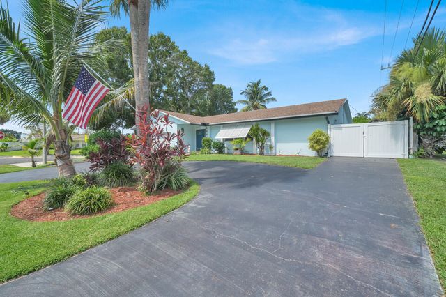 10015 DAISY Avenue, Palm Beach Gardens, FL 33410