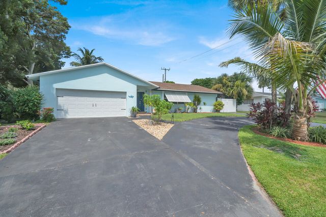 10015 DAISY Avenue, Palm Beach Gardens, FL 33410
