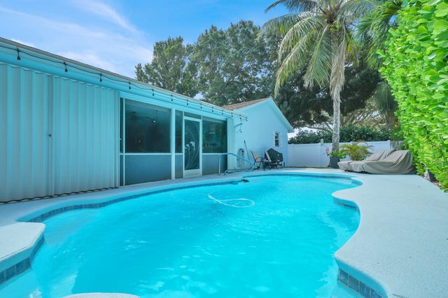 10015 DAISY Avenue, Palm Beach Gardens, FL 33410