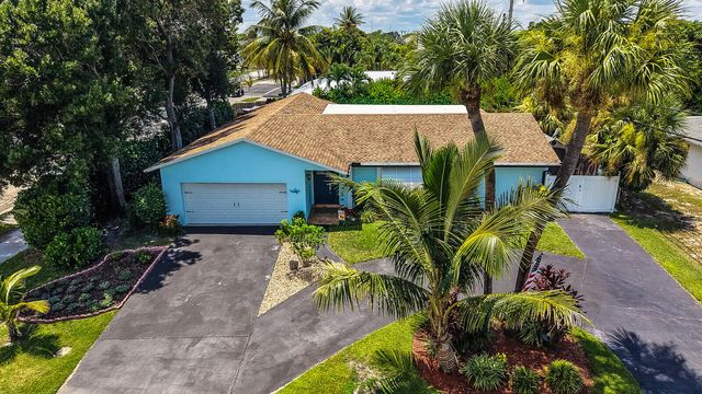 10015 DAISY Avenue, Palm Beach Gardens, FL 33410