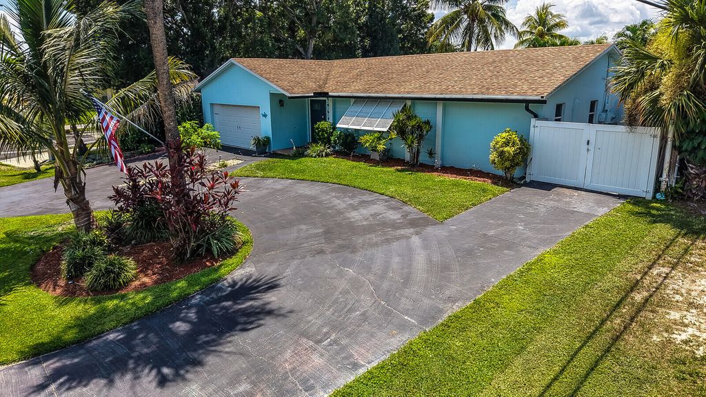 10015 DAISY Avenue, Palm Beach Gardens, FL 33410
