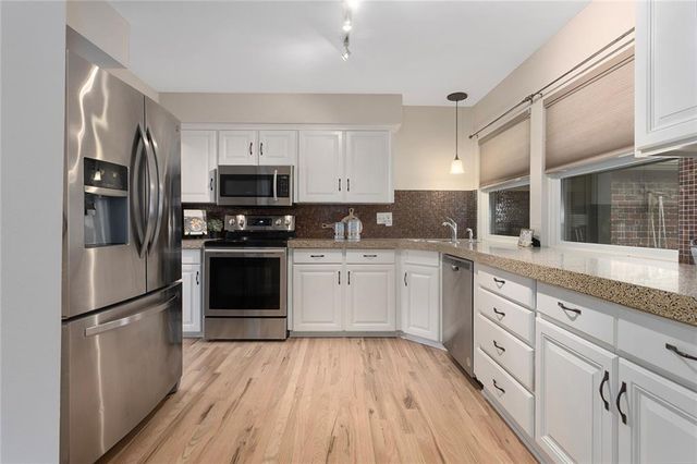 10228 ROBINSON Street, Overland Park, KS 66212