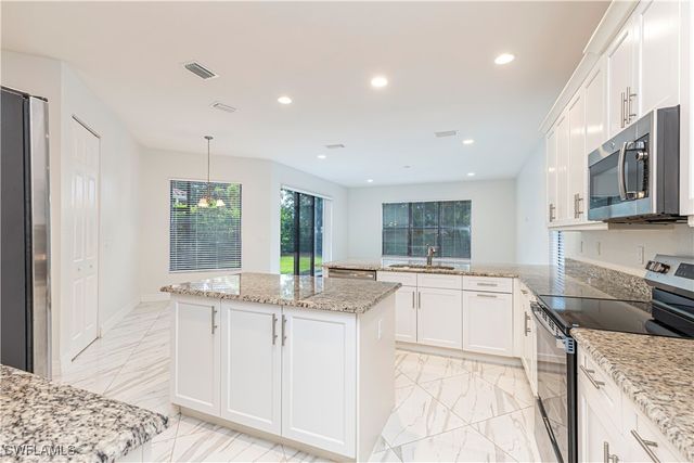 13852 Luna DR, Naples, FL 34109