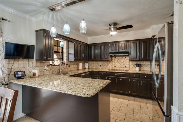 1608 YUCCA STREET, Iowa Park, TX 76367