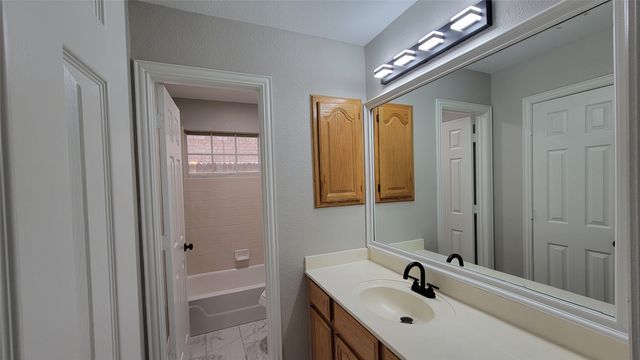 9726 Windy Hollow Drive, Irving, TX 75063
