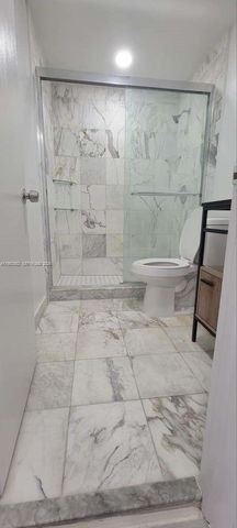 455 Golden Isles Dr 310, Hallandale Beach, FL 33009