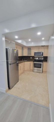 455 Golden Isles Dr 310, Hallandale Beach, FL 33009