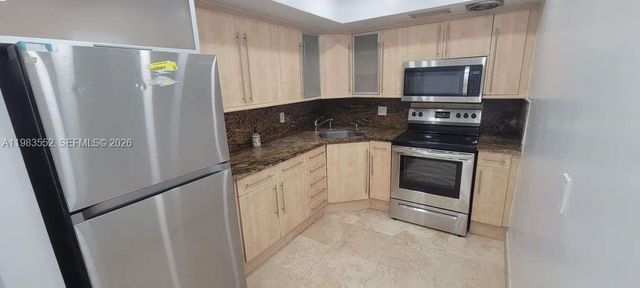 455 Golden Isles Dr 310, Hallandale Beach, FL 33009